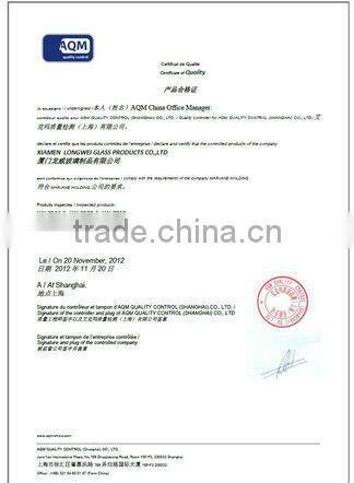 round and square glass bottle with wooden lid