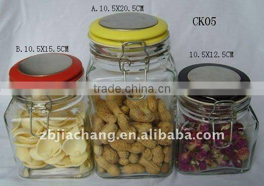 Square glass jar used for storage jam with clamp