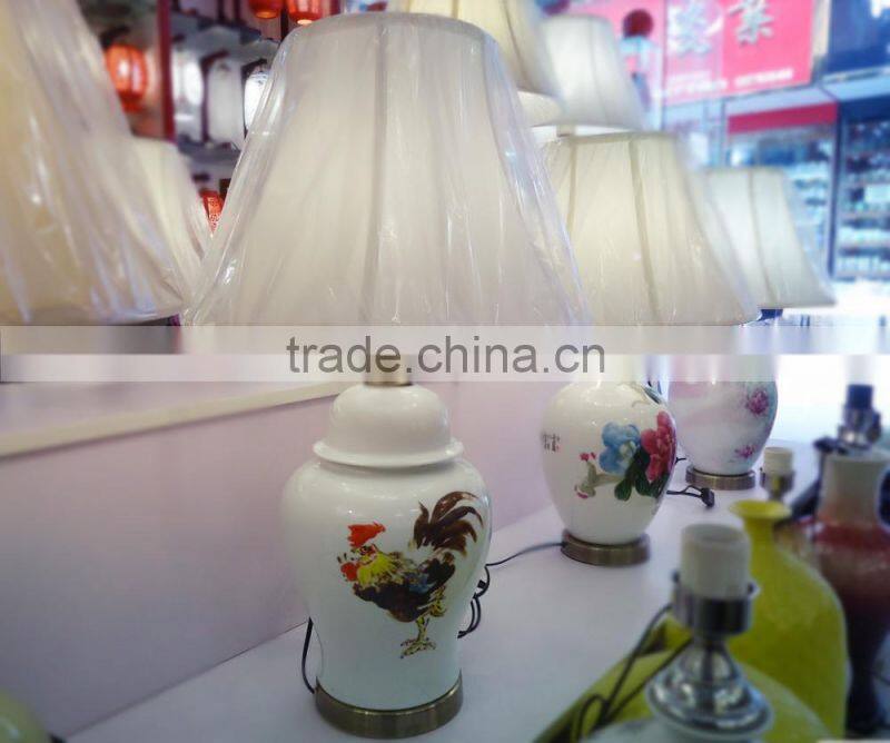 Flower painted white besides table lamps