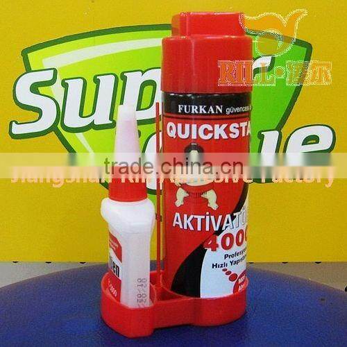 Spray activator adhesive