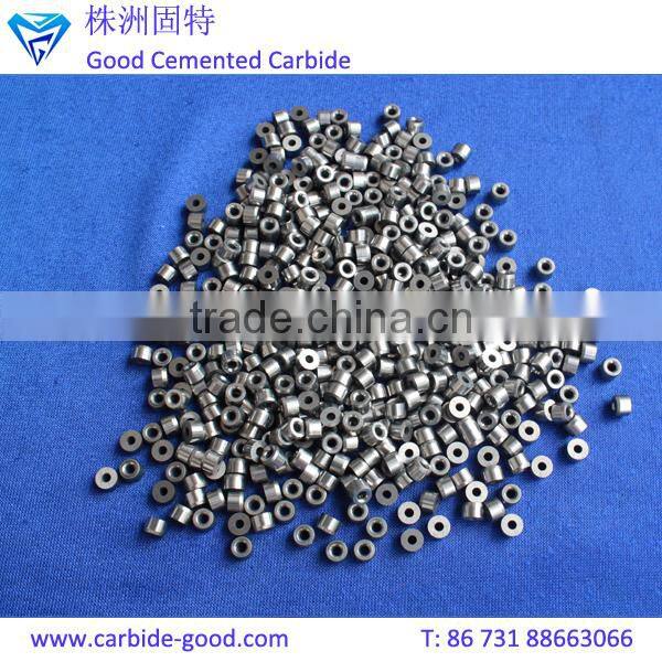 Discharge valve seat made from tungsten carbide