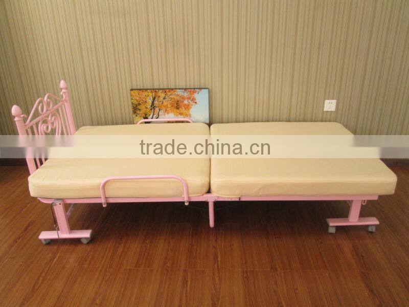 single pink folding metal bed