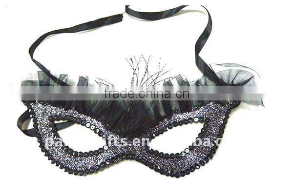Glittered mask with feather for Carnival Party