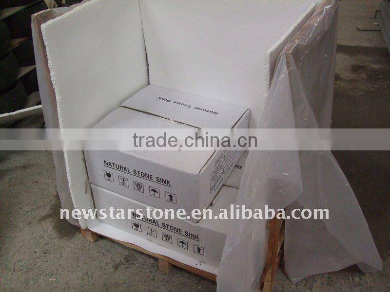 white marble vessel sinks