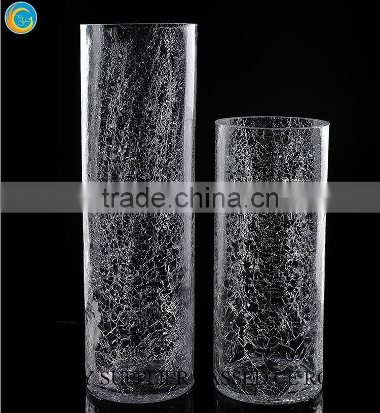 Clear glass cylinder vases and candle holders