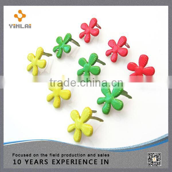 Gold decorative brads for scrapbooking