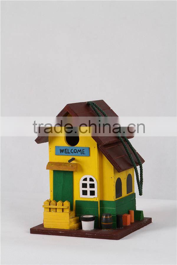 New wooden yellow colored birdhouse for decoration birdcage