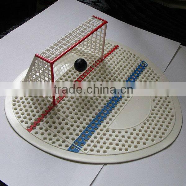 Sport themed urinal screen mat with hockey ball