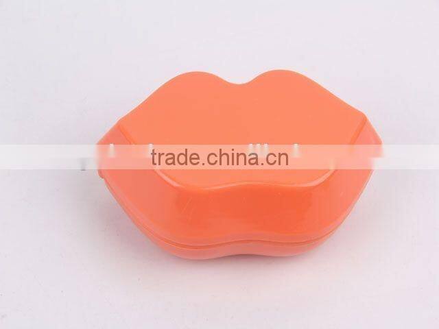 Lip shaped plastic massage comb with mirror/hair brush