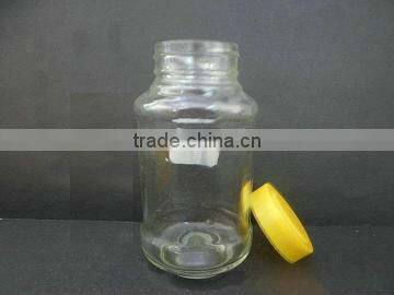 clear storage jar for honey, empty glass bottle
