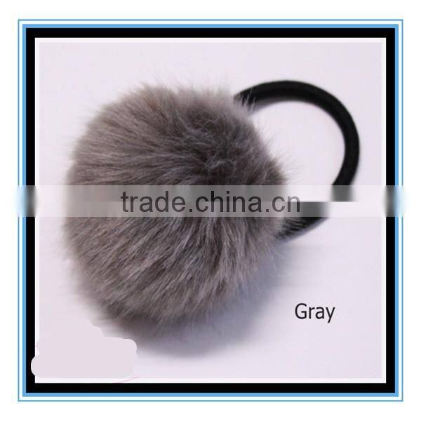Cheap wholesale price elastic fur fluffy ball pom pom Scrunchie Ponytail holder Hair Accessories