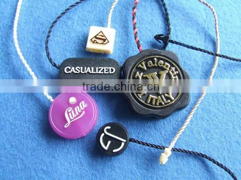 customized brand embossed plastic seal tags