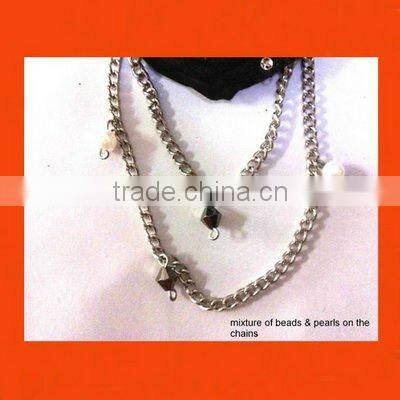 LACE ACRYLIC STONE AND FEATHER PARTY CORSAGE