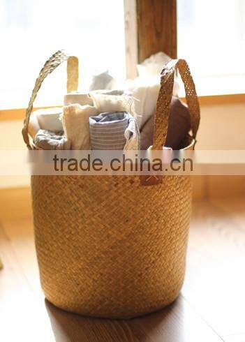 basket made of natural straw seagrass for housewaring with handle and lining