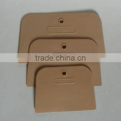 plastic putty scraper