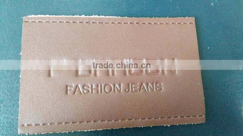 Wholesale embossed logo on PU leather patch for jeans and bags