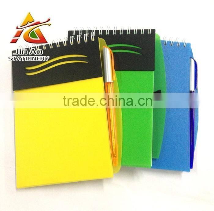 plastic notebook with pen