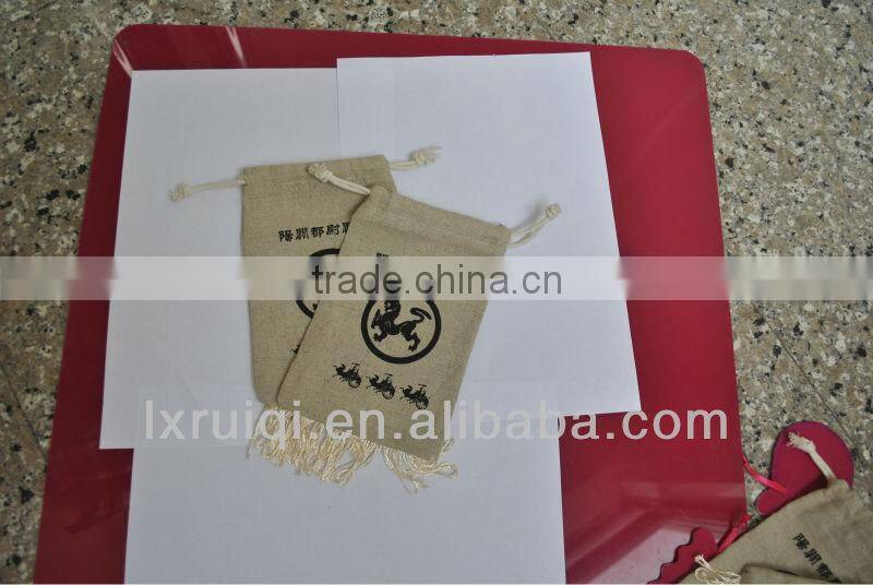 yiwu market cheap jute bag ,drawstring jute packing bags with tassel,promotion pouch