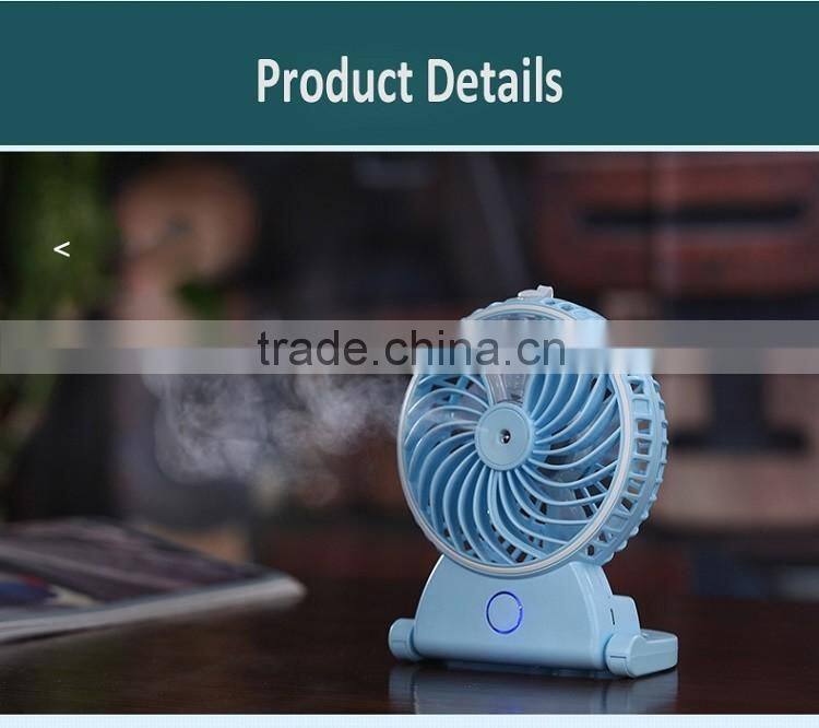 The new mini USB charging beauty spray fan humidification mini fan portable hand held air conditioner fan