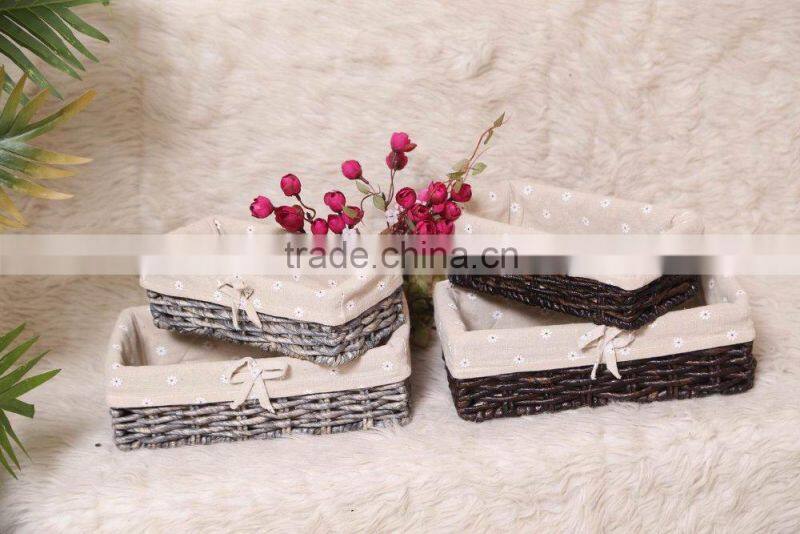 set of 2 maize weaved remote storage baskets