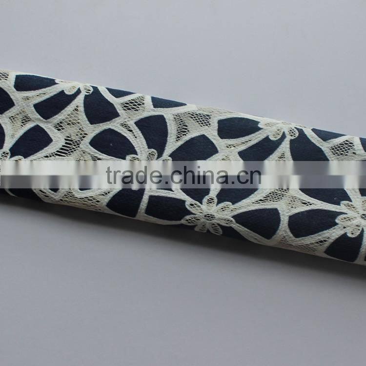 Navy blue flower lace fabric with white holes