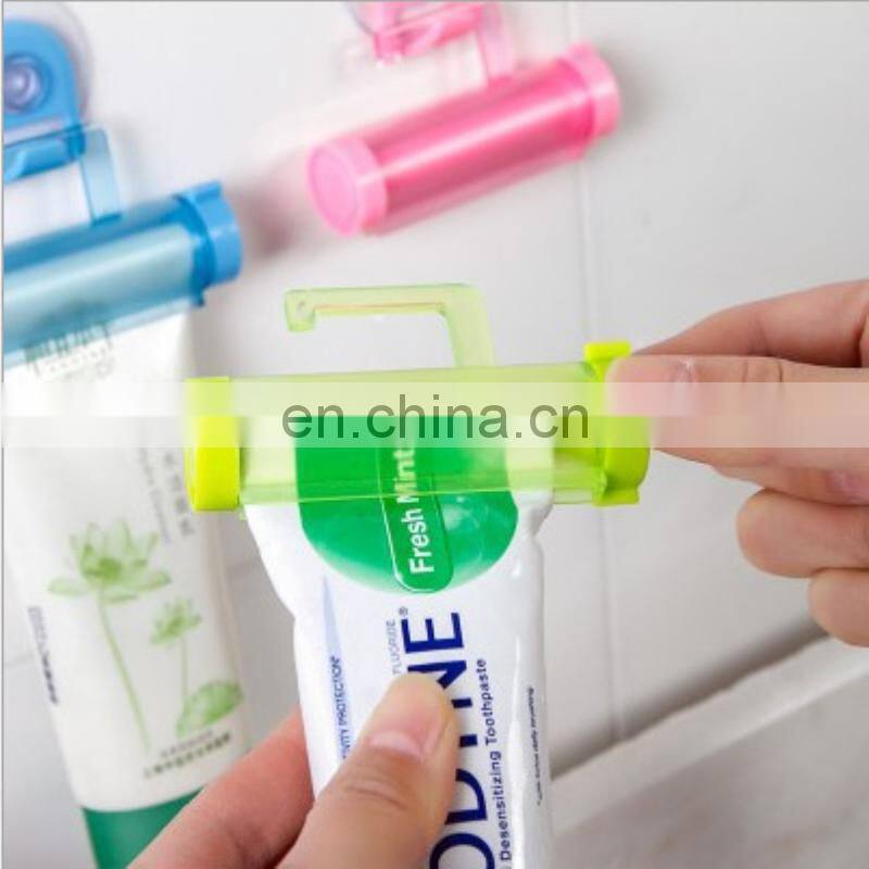 Manual Dispenser Rolling Squeezer Toothpaste Dispenser Tube Sucker Holder Bathroom Accessories