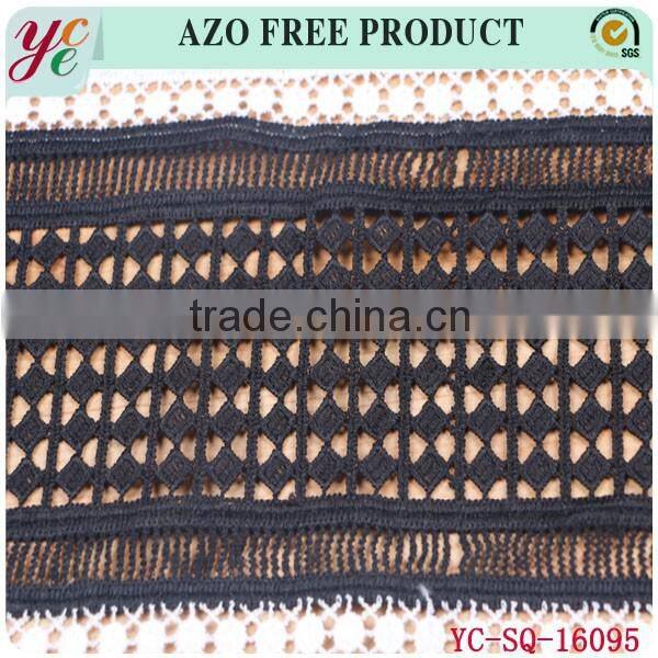 Summer new black hollow out small grid with a clover lace embroidery fabric