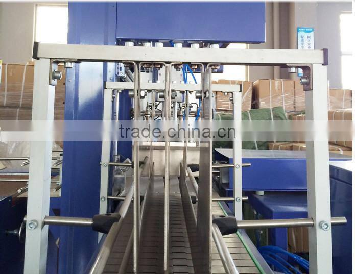 Automatic hot shrink film wrapping packing machine