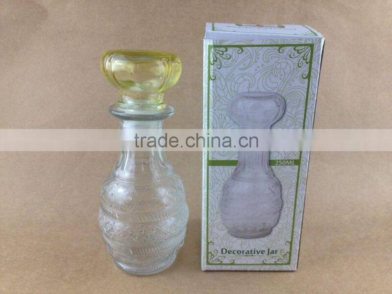 clear body yellow lid glass diffuser bottle