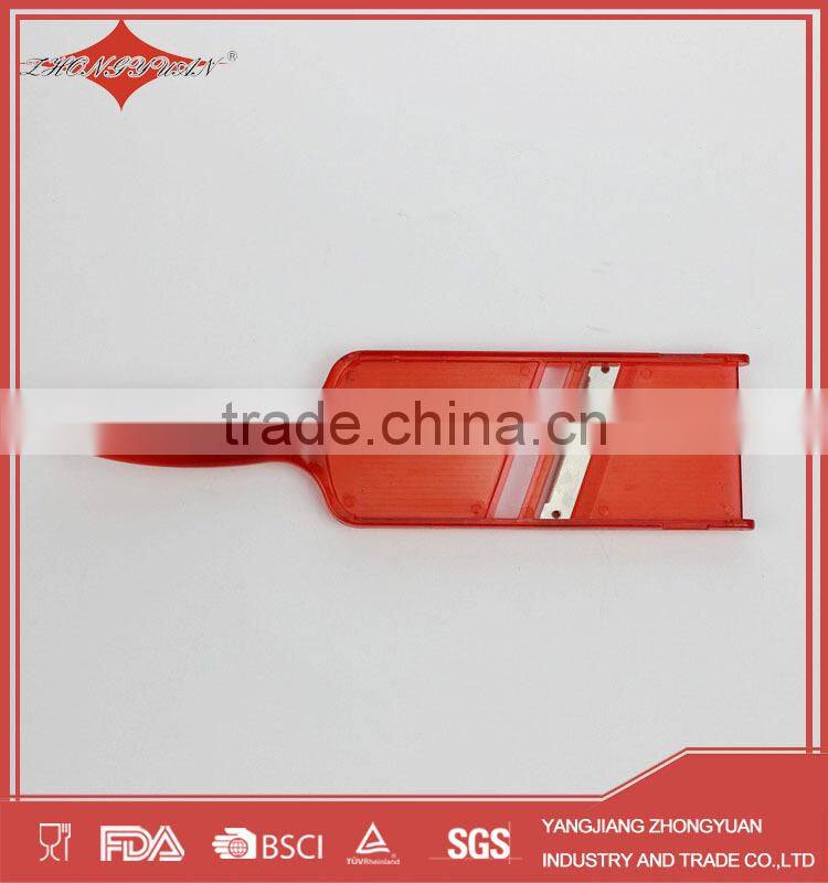 red stainless steel julienne vegetable peeler