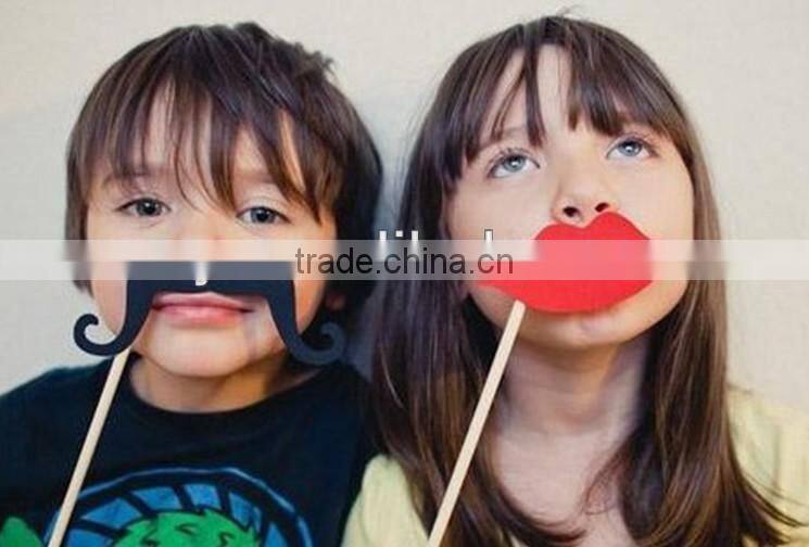 Paper fake moustache and false lips false beard