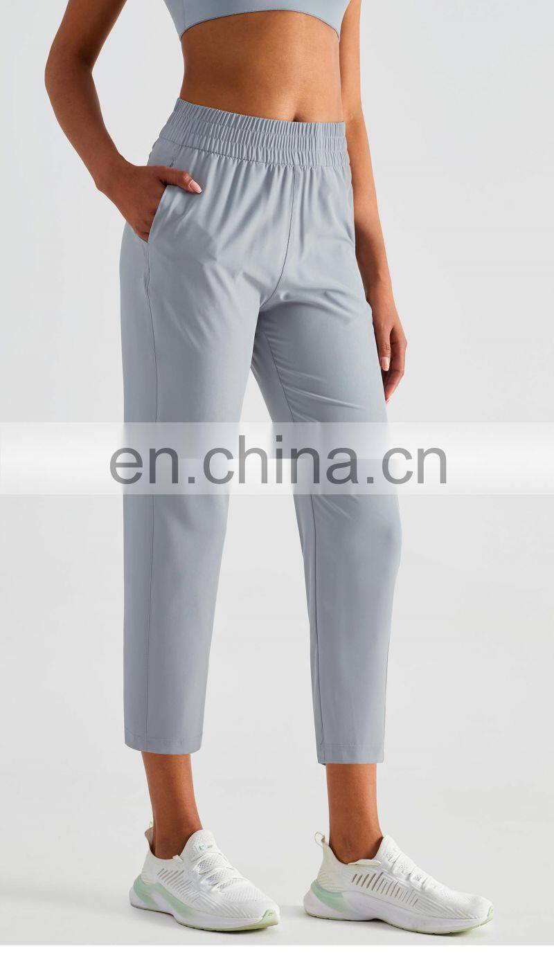 Elastic High Waist Peach Hip Lift Fitness Sweatpants Women Jogging Trouser With Side Pocket