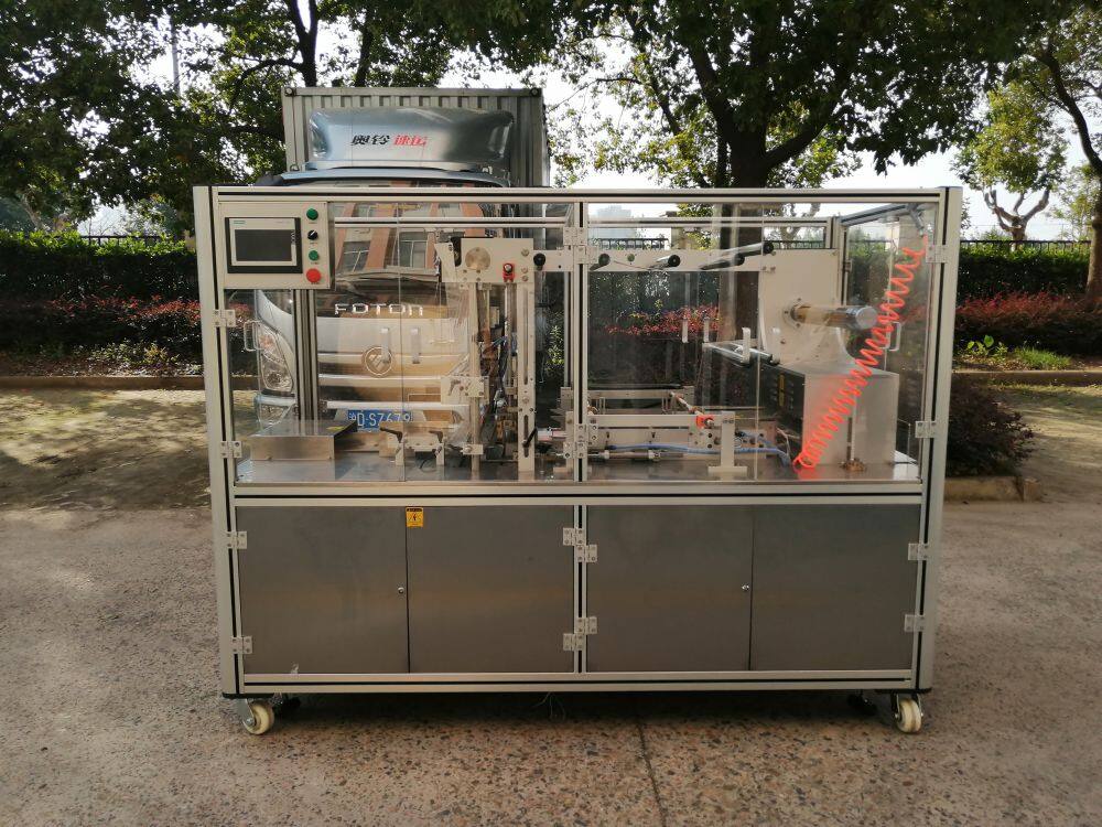 QD-2000三维透明膜包装机(气动) (3).jpg