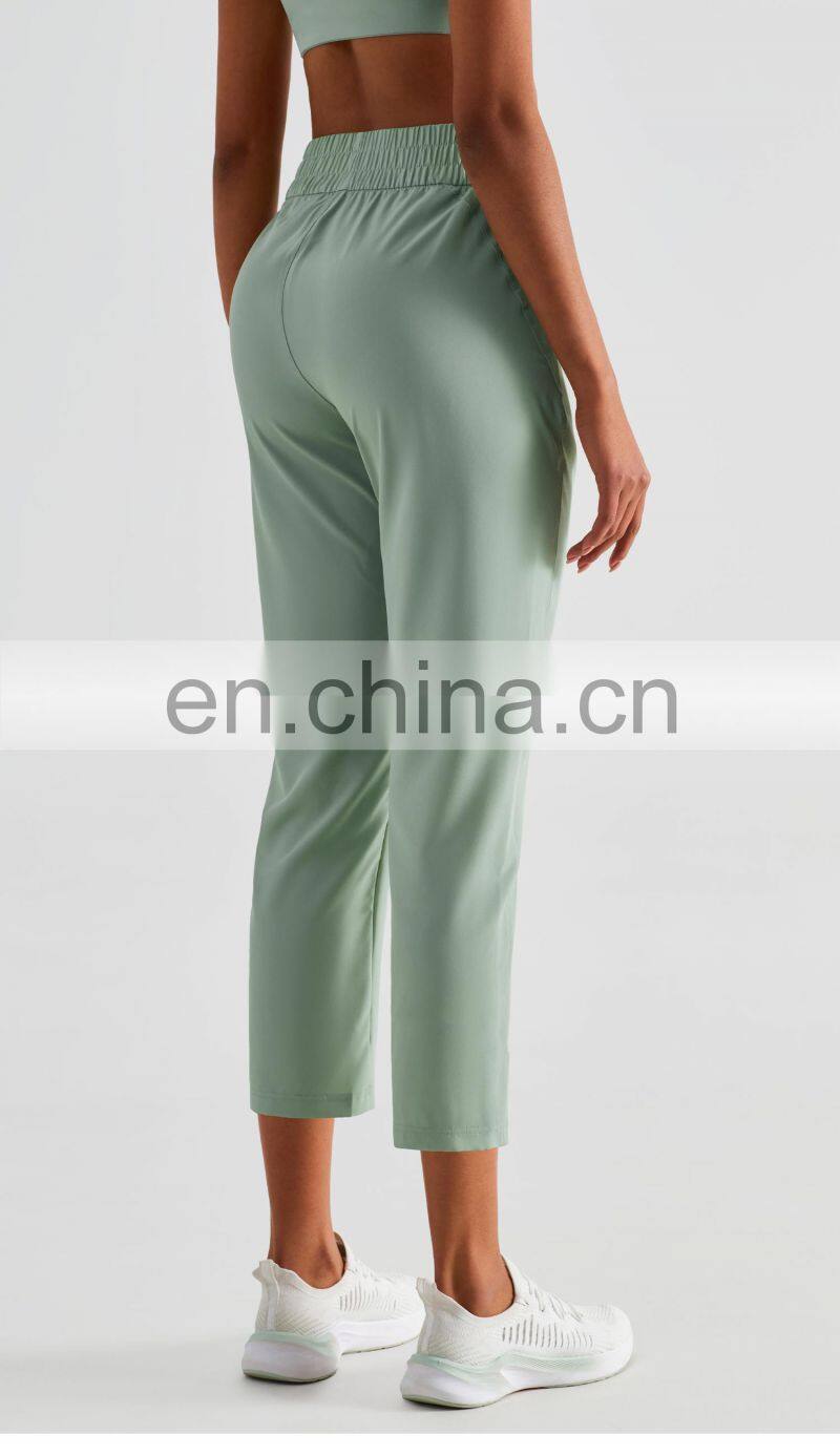 Elastic High Waist Peach Hip Lift Fitness Sweatpants Women Jogging Trouser With Side Pocket