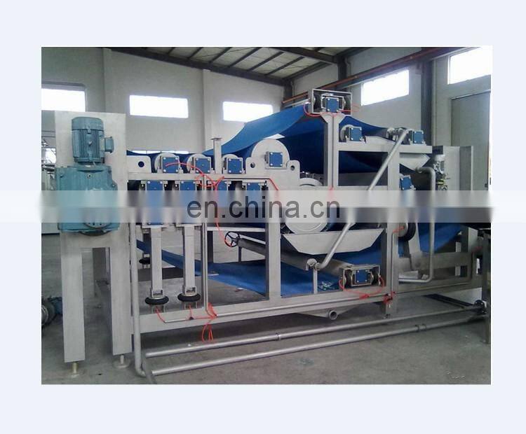 Orange juice belt extractor machine