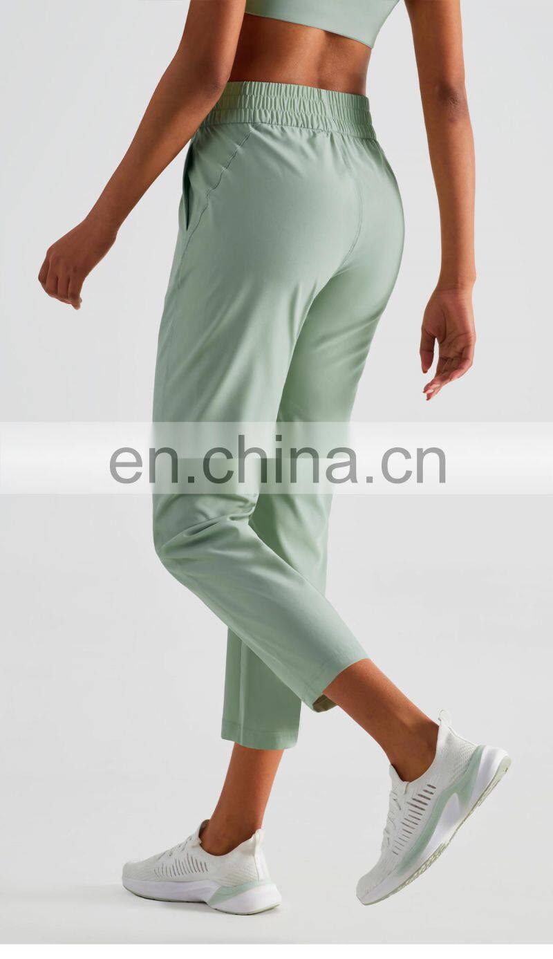 Elastic High Waist Peach Hip Lift Fitness Sweatpants Women Jogging Trouser With Side Pocket