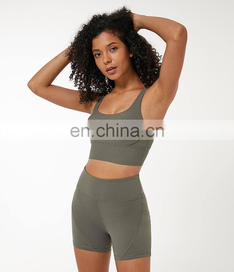 Custom new 75% nylon 25% spandex thread fabric ladies gym wear strappy sports bra top fitness bra for women