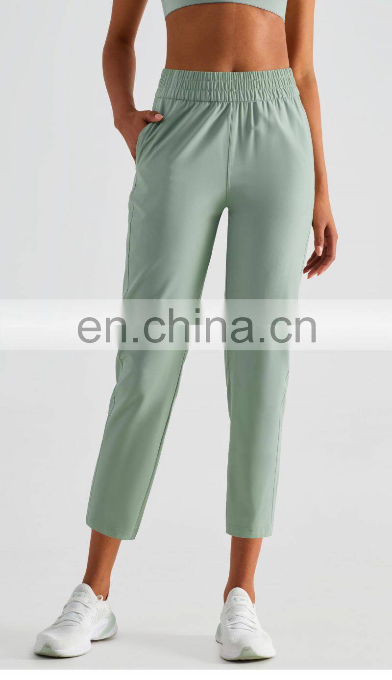 Elastic High Waist Peach Hip Lift Fitness Sweatpants Women Jogging Trouser With Side Pocket