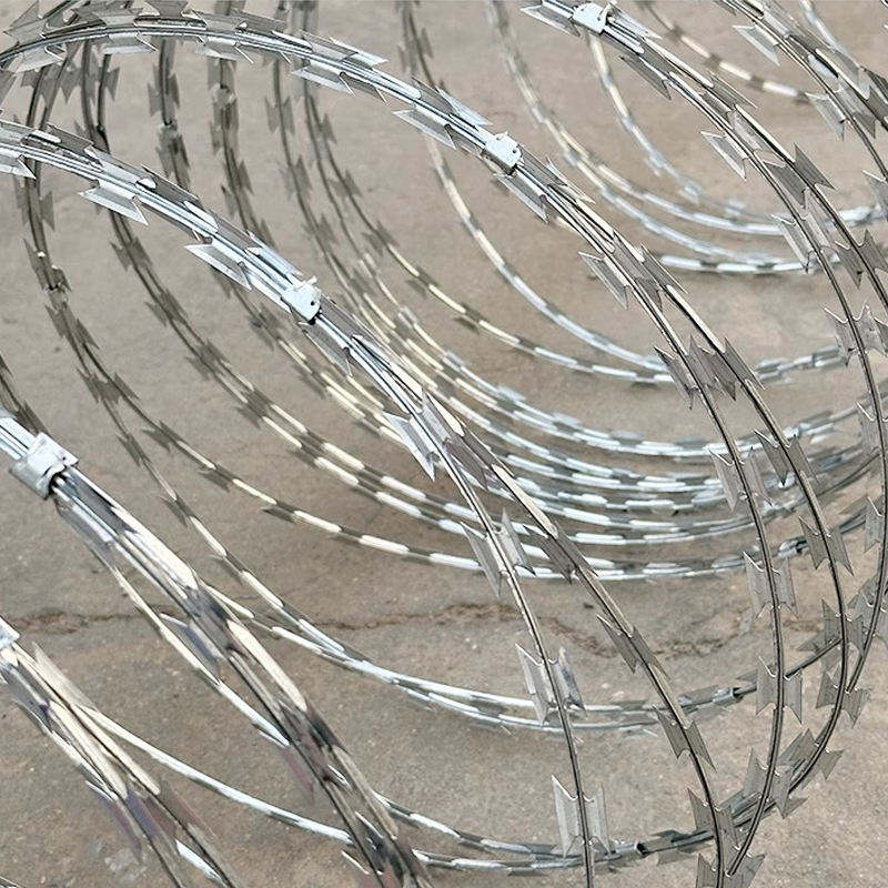 Нержавеющая стальная колючая проволока, бритвенная проволока, клетка из бритвенной проволоки, змеевиковая проволока, антилезний забор для стен и т.д.