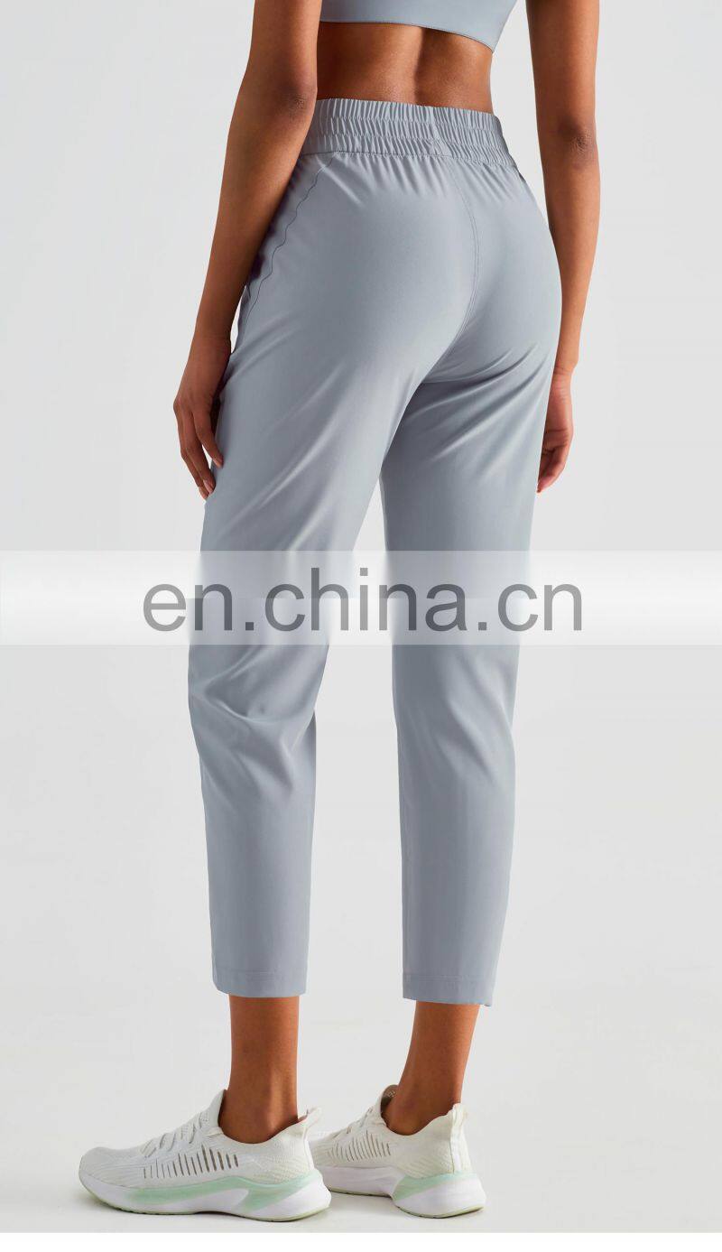 Elastic High Waist Peach Hip Lift Fitness Sweatpants Women Jogging Trouser With Side Pocket