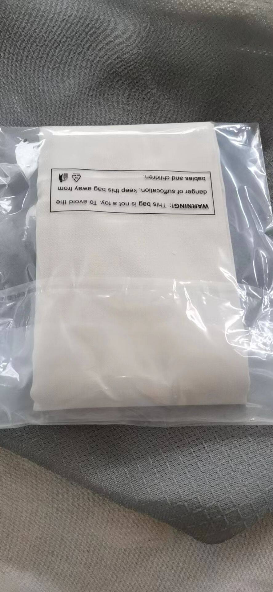 8oz 6x9ft canvas drop cloth with plastic bag back view.jpg