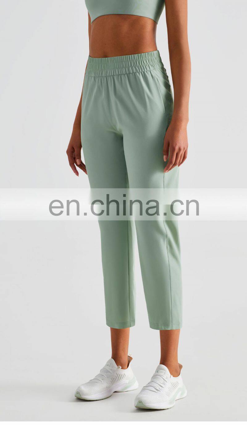 Elastic High Waist Peach Hip Lift Fitness Sweatpants Women Jogging Trouser With Side Pocket