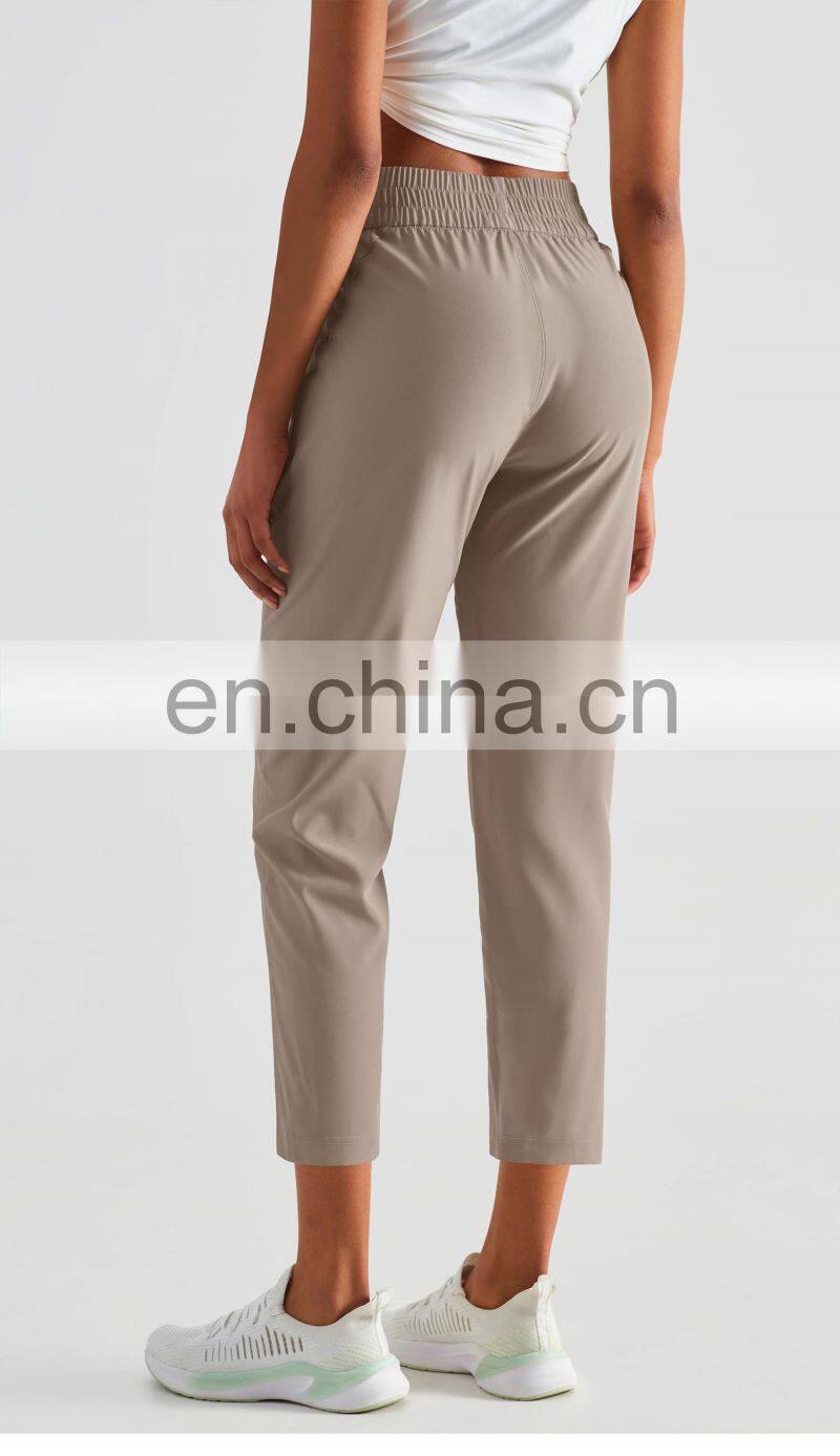 Elastic High Waist Peach Hip Lift Fitness Sweatpants Women Jogging Trouser With Side Pocket