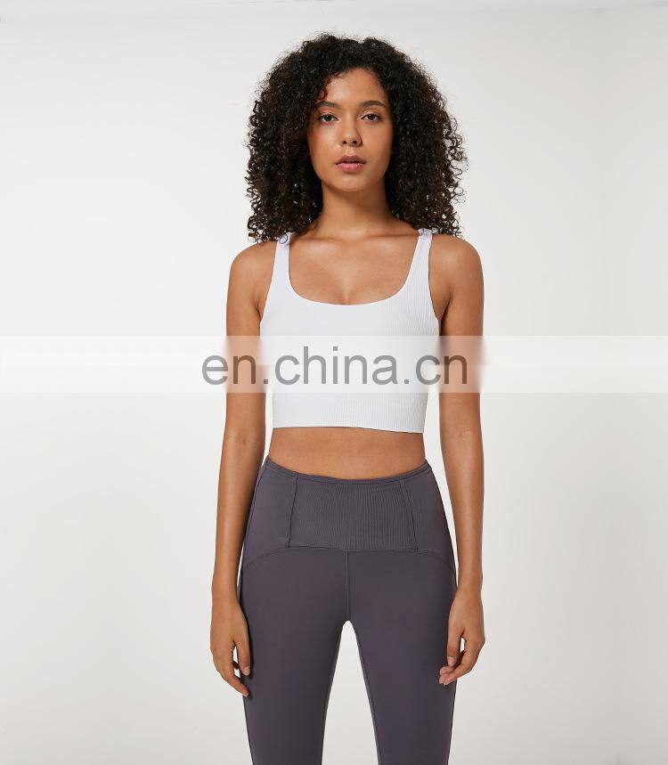 Custom new 75% nylon 25% spandex thread fabric ladies gym wear strappy sports bra top fitness bra for women