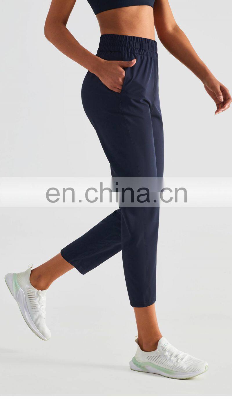 Elastic High Waist Peach Hip Lift Fitness Sweatpants Women Jogging Trouser With Side Pocket