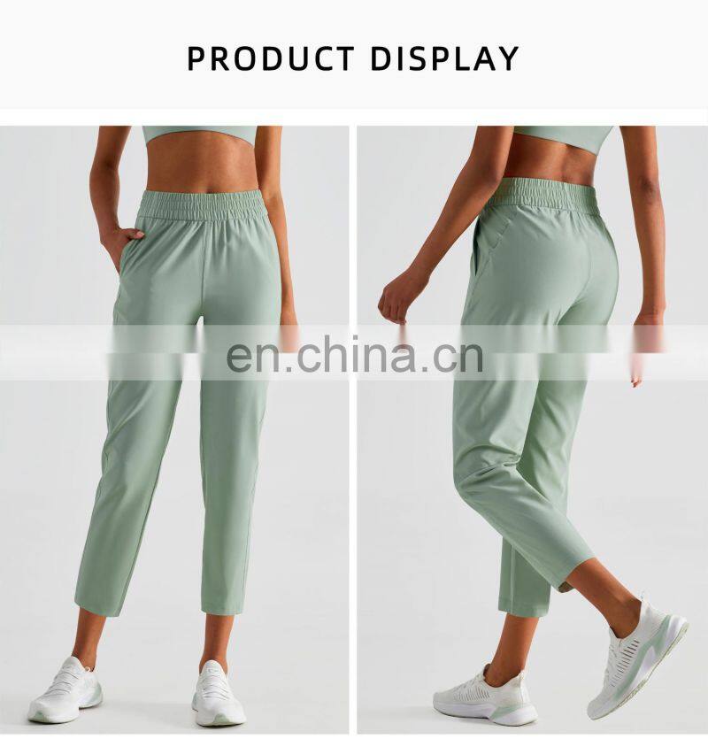 Elastic High Waist Peach Hip Lift Fitness Sweatpants Women Jogging Trouser With Side Pocket