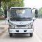 Hook arm garbage truck