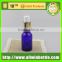 blue glass bottle with plastic spray cap for cosmetic packing