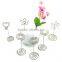 heart shaped wire holder memo clips with spiral wire base for party favors at a wedding reception