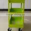 green tool trolley with handle and wheels